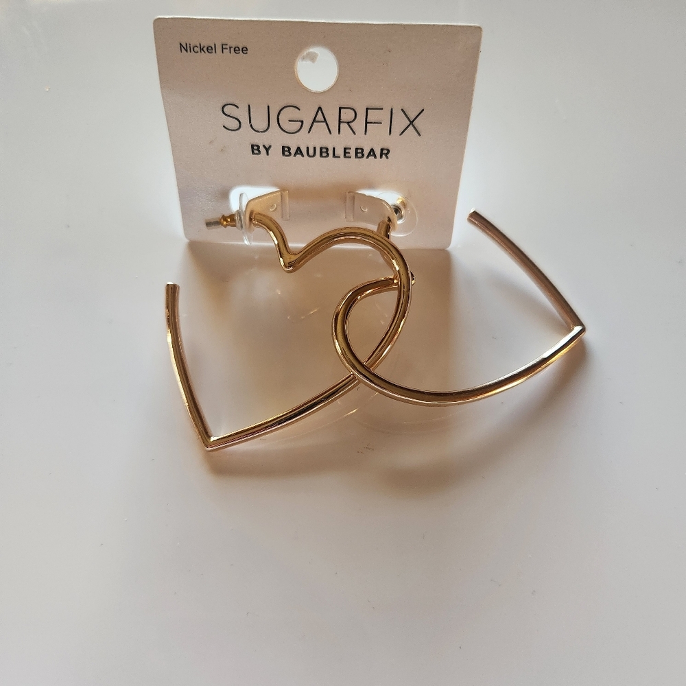 Large Heart Shaped Gold Tone Hoop Earrings